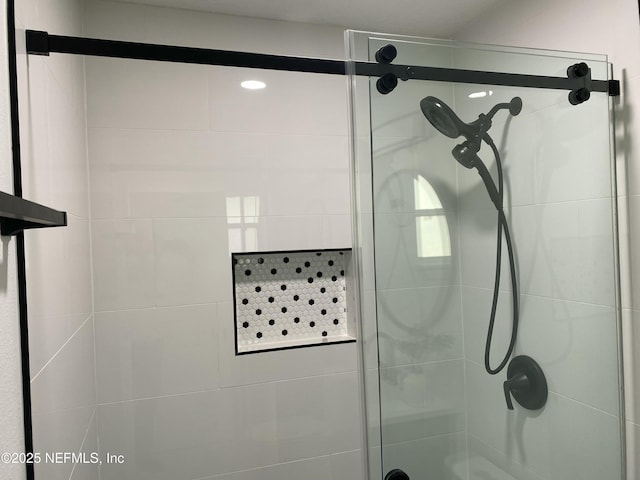 full bathroom featuring a stall shower