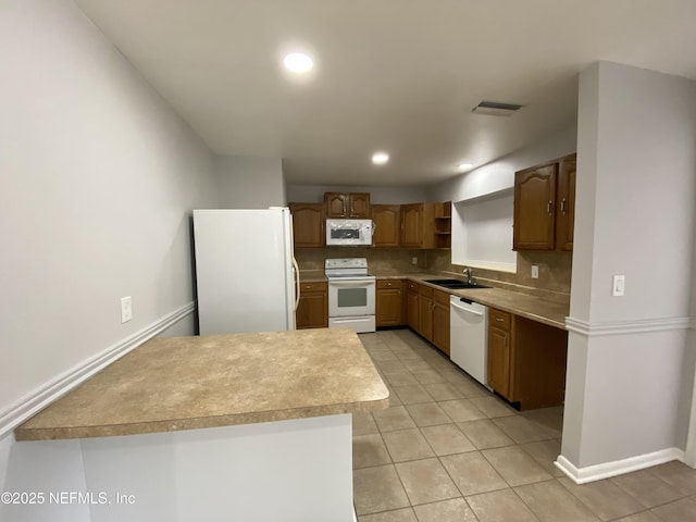 2320 Ardmore Ct, Jacksonville, FL 32211 - kitchen featuring white appliances, backsplash, light tile patterned floors, open shelves, and light countertops