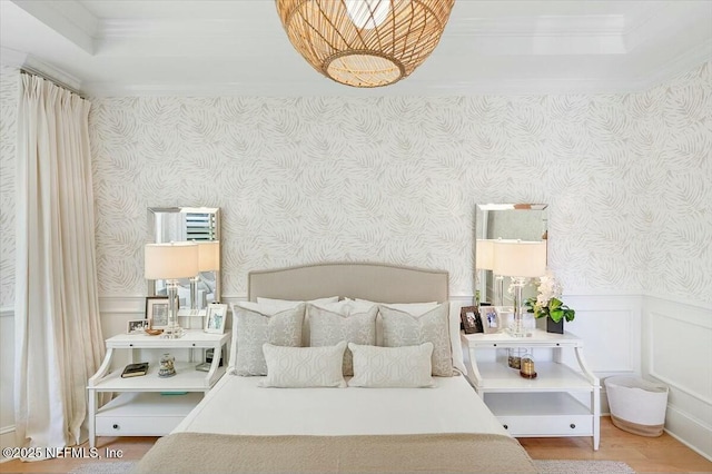 36 Preserve Island Cir, Ponte Vedra Beach, FL 32082 - bedroom with wood finished floors, a raised ceiling, ornamental molding, and wallpapered walls