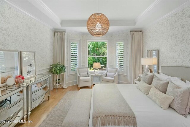 36 Preserve Island Cir, Ponte Vedra Beach, FL 32082 - bedroom featuring multiple windows, wallpapered walls, and wood finished floors