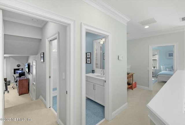36 Preserve Island Cir, Ponte Vedra Beach, FL 32082 - corridor featuring ornamental molding, a sink, light carpet, and visible vents
