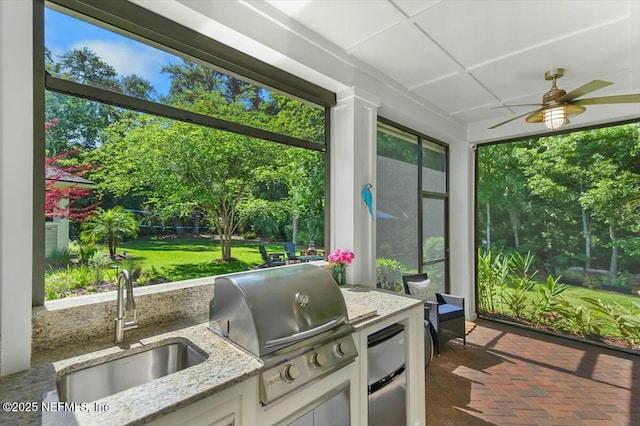 36 Preserve Island Cir, Ponte Vedra Beach, FL 32082 - sunroom featuring an outdoor kitchen, ceiling fan, brick floor, and a sink