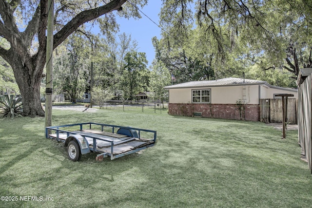 view of yard with fence