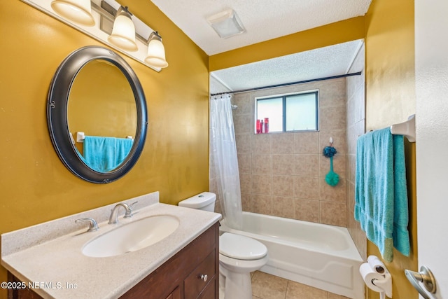 bathroom featuring a textured ceiling, toilet, shower / bath combination with curtain, vanity, and tile patterned flooring