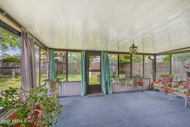 unfurnished sunroom with a healthy amount of sunlight