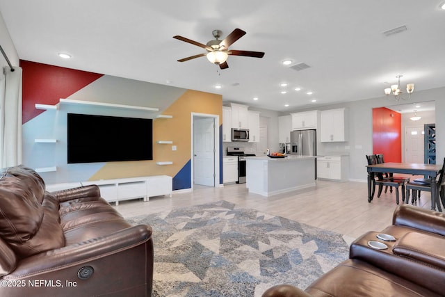 383 Narrowleaf Dr, Saint Johns, FL 32259 - living room featuring recessed lighting, baseboards, visible vents, and ceiling fan with notable chandelier