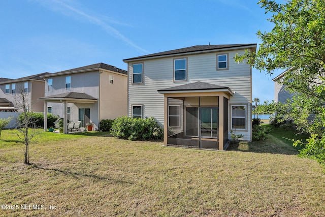 383 Narrowleaf Dr, Saint Johns, FL 32259 - back of house featuring a sunroom and a yard
