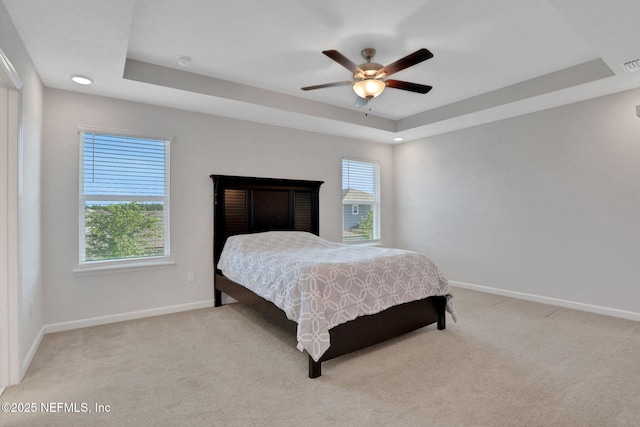 383 Narrowleaf Dr, Saint Johns, FL 32259 - bedroom with visible vents, light carpet, baseboards, and a tray ceiling