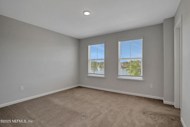 383 Narrowleaf Dr, Saint Johns, FL 32259 - spare room with baseboards and carpet