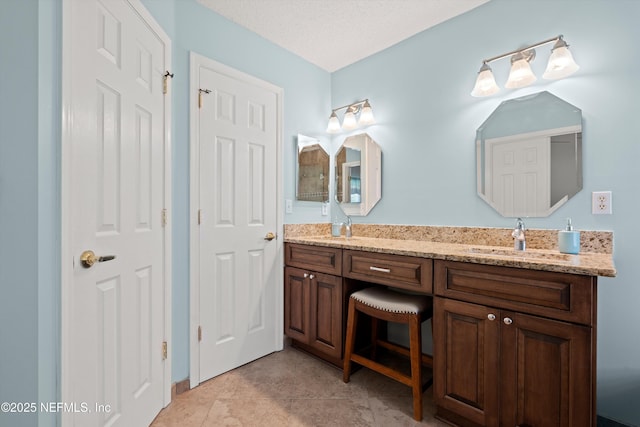 bathroom with double vanity and a sink