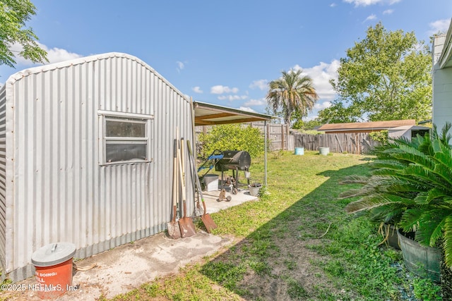 view of yard featuring a fenced backyard