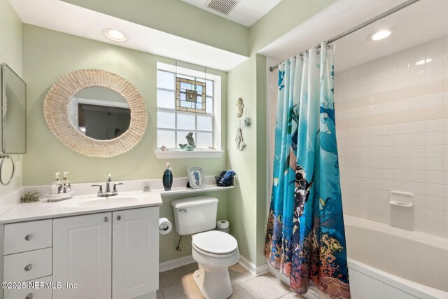 30936 Paradise Commons Unit 221, Fernandina Beach, FL 32034 - bathroom featuring recessed lighting, vanity, tile patterned floors, toilet, and visible vents