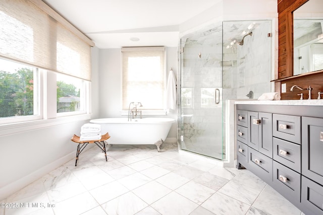 full bathroom featuring a freestanding tub, a shower stall, marble finish floor, and vanity