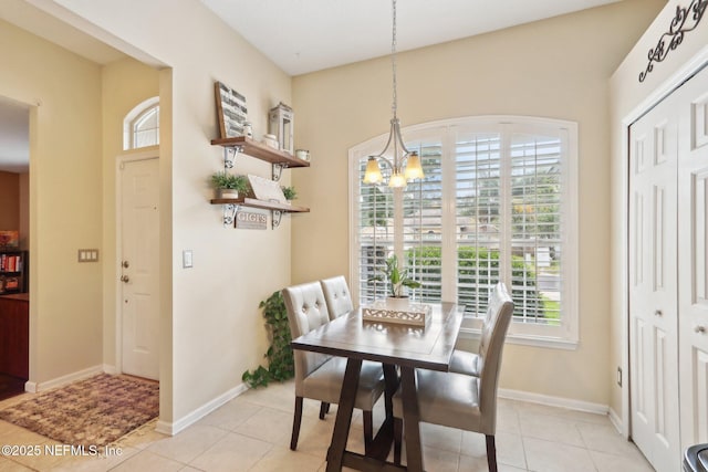 716 Hazelmoor Ln, Ponte Vedra, FL 32081 - dining room with baseboards, light tile patterned flooring, and a notable chandelier