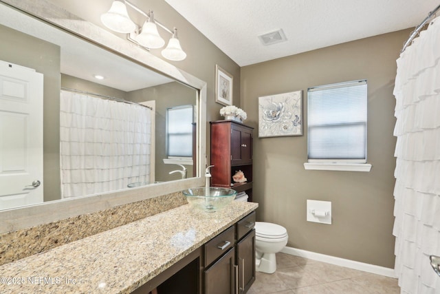 716 Hazelmoor Ln, Ponte Vedra, FL 32081 - bathroom with visible vents, tile patterned floors, baseboards, vanity, and toilet