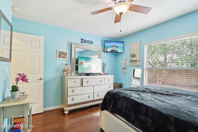 716 Hazelmoor Ln, Ponte Vedra, FL 32081 - bedroom with baseboards, ceiling fan, dark wood-style flooring, and a textured ceiling