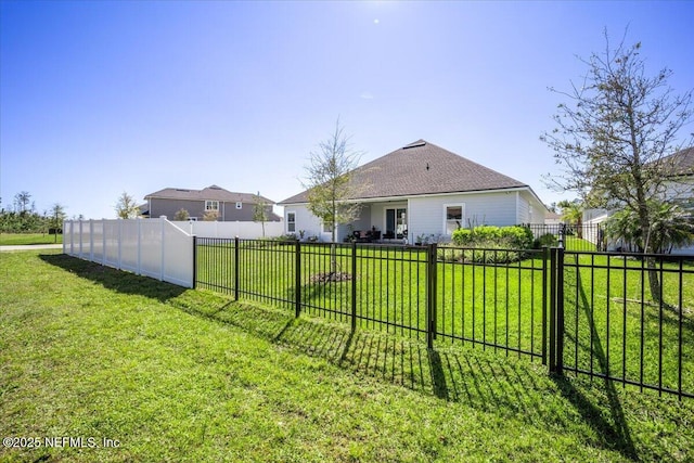 view of yard featuring fence