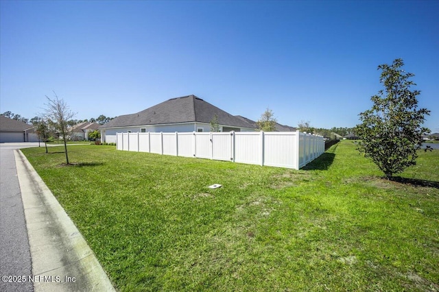 view of yard with fence