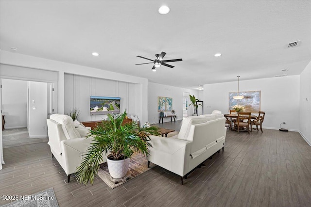 living room with recessed lighting, wood finished floors, visible vents, and ceiling fan