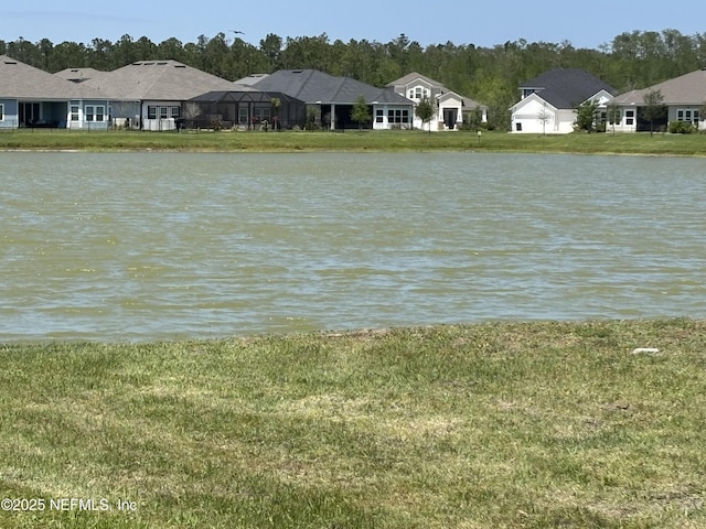 view of water feature with a residential view