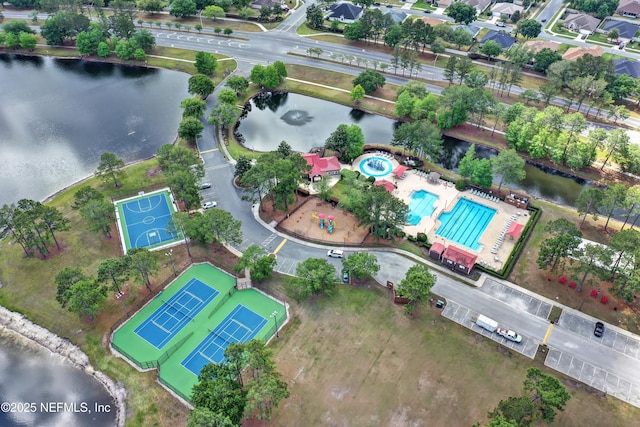 birds eye view of property featuring a water view