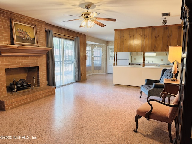 3715 Rustic Ln, Jacksonville, FL 32217 - living area with ceiling fan and a fireplace