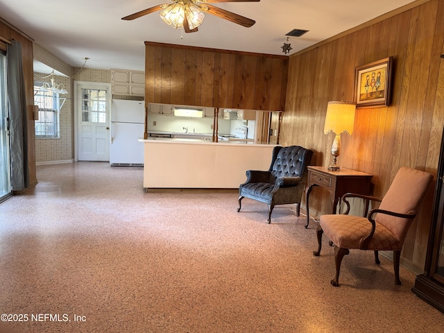 3715 Rustic Ln, Jacksonville, FL 32217 - sitting room with ceiling fan and wooden walls