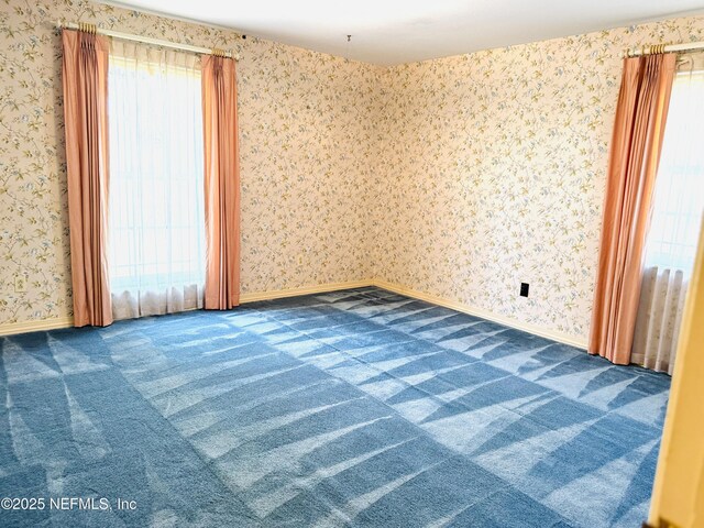 3715 Rustic Ln, Jacksonville, FL 32217 - carpeted spare room featuring wallpapered walls