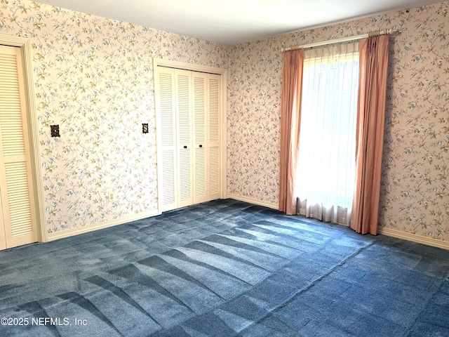 3715 Rustic Ln, Jacksonville, FL 32217 - unfurnished room with carpet and wallpapered walls