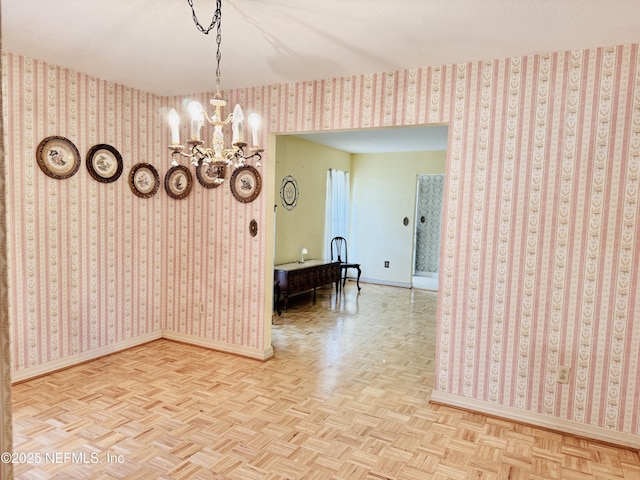 3715 Rustic Ln, Jacksonville, FL 32217 - dining space featuring baseboards, a chandelier, and wallpapered walls