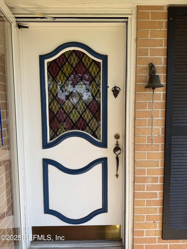 3715 Rustic Ln, Jacksonville, FL 32217 - entrance to property featuring brick siding