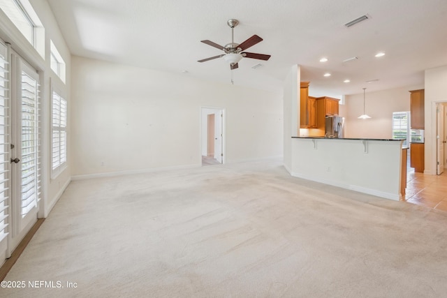 3099 Five Oaks Ln, Green Cove Springs, FL 32043 - unfurnished living room featuring baseboards, a ceiling fan, recessed lighting, and light carpet