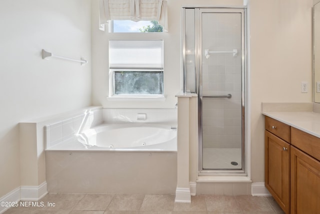 3099 Five Oaks Ln, Green Cove Springs, FL 32043 - full bathroom with a shower stall, vanity, tile patterned floors, and healthy amount of natural light