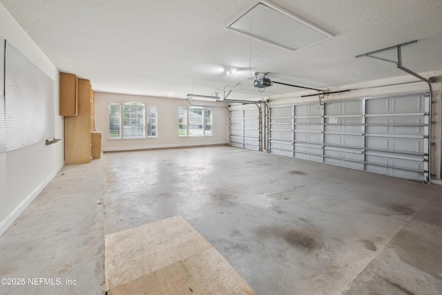 3099 Five Oaks Ln, Green Cove Springs, FL 32043 - garage with a garage door opener and baseboards