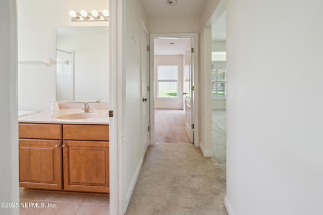 3099 Five Oaks Ln, Green Cove Springs, FL 32043 - hall with a sink, light carpet, and baseboards