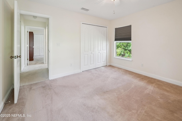 3099 Five Oaks Ln, Green Cove Springs, FL 32043 - unfurnished bedroom featuring carpet flooring, a closet, and baseboards