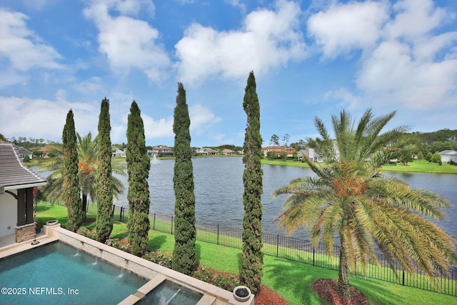 water view featuring fence