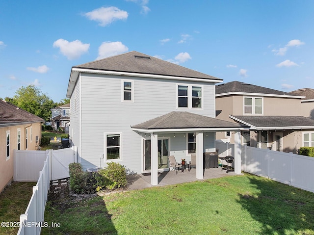 206 Woodland Greens Dr, Ponte Vedra, FL 32081 - back of property with a fenced backyard, a yard, a patio, and a shingled roof