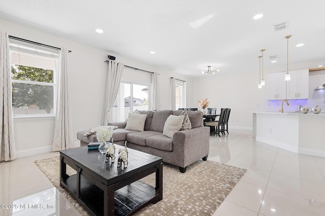 206 Woodland Greens Dr, Ponte Vedra, FL 32081 - living room featuring visible vents, light tile patterned floors, and a healthy amount of sunlight