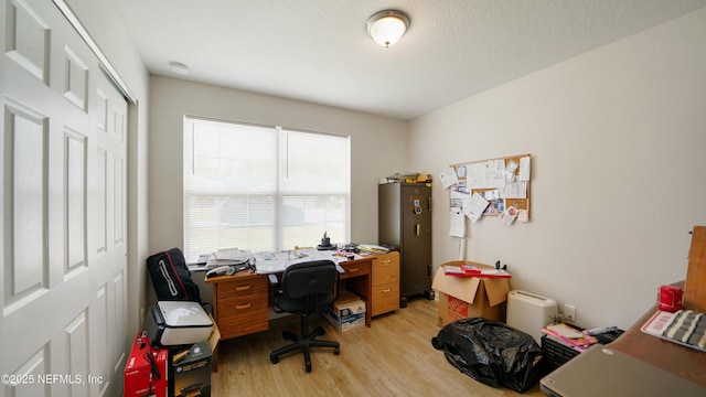 home office with light wood-type flooring