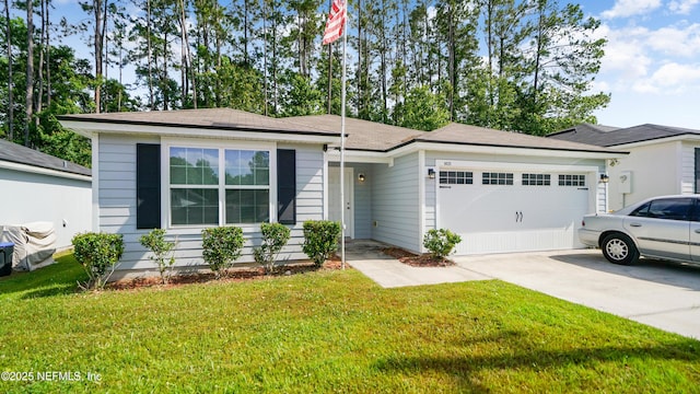 ranch-style house featuring an attached garage, driveway, and a front yard