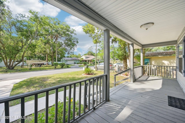 wooden deck featuring a porch