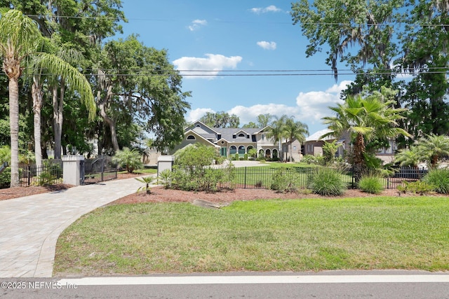 1833 N Lakeshore Dr, Fleming Island, FL 32003 - view of home's community with fence, a yard, and driveway