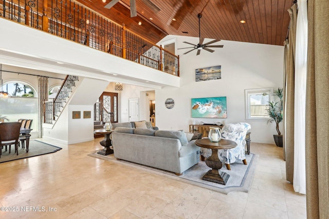 1833 N Lakeshore Dr, Fleming Island, FL 32003 - living room featuring stairway, wood ceiling, a ceiling fan, and a healthy amount of sunlight