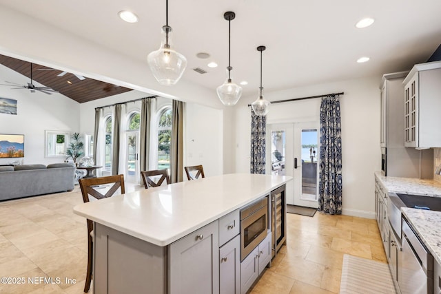 1833 N Lakeshore Dr, Fleming Island, FL 32003 - kitchen with french doors, gray cabinets, recessed lighting, stainless steel microwave, and visible vents