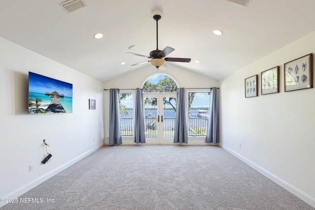 1833 N Lakeshore Dr, Fleming Island, FL 32003 - unfurnished room featuring carpet floors, ceiling fan, visible vents, and vaulted ceiling