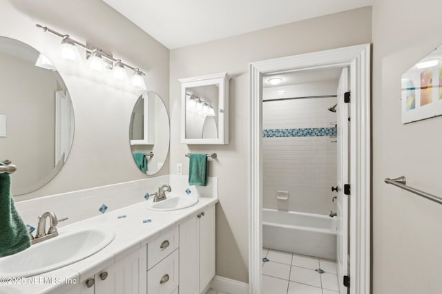 1833 N Lakeshore Dr, Fleming Island, FL 32003 - bathroom featuring shower / bathtub combination, double vanity, a sink, and tile patterned flooring