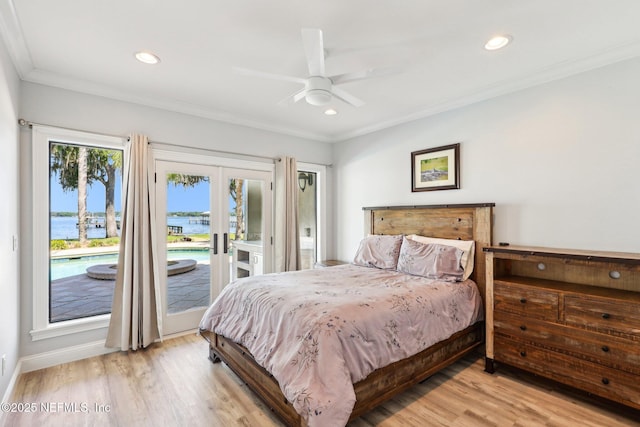 1833 N Lakeshore Dr, Fleming Island, FL 32003 - bedroom with crown molding, french doors, light wood-style flooring, and access to exterior