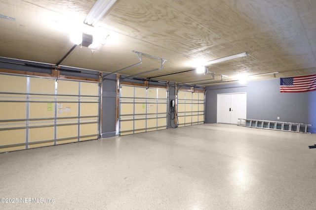 1833 N Lakeshore Dr, Fleming Island, FL 32003 - garage featuring a garage door opener