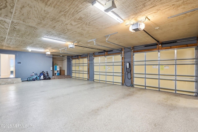 1833 N Lakeshore Dr, Fleming Island, FL 32003 - garage featuring a garage door opener